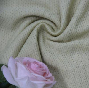 COMBED COTTON AND MUGWOOD FIBER BLENDED YARN